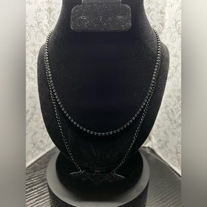 20” Necklace with a Bat pendant and chain extender. Handmade by Mua.